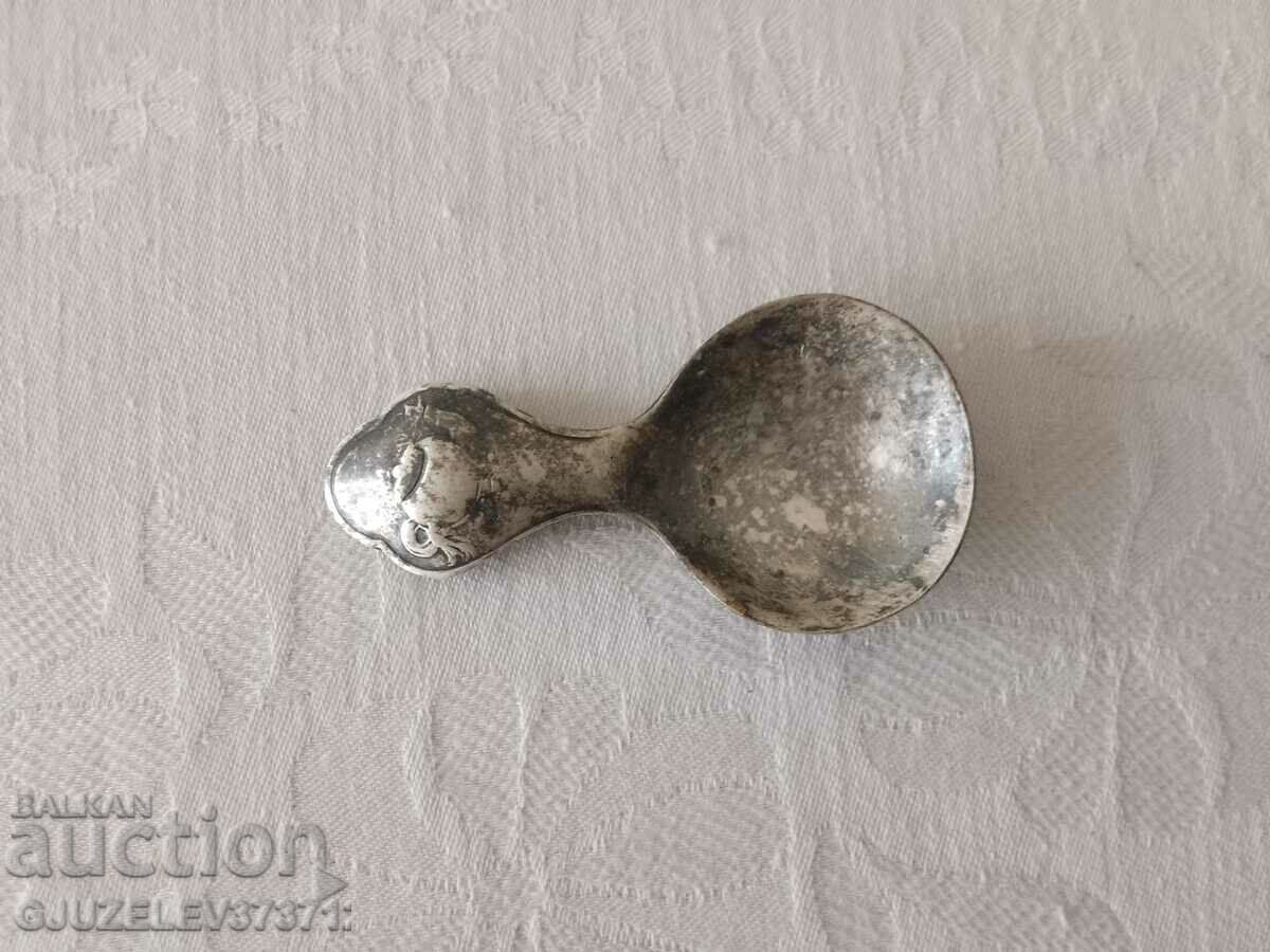 Art deco spoon for feeding a child or for measuring tea