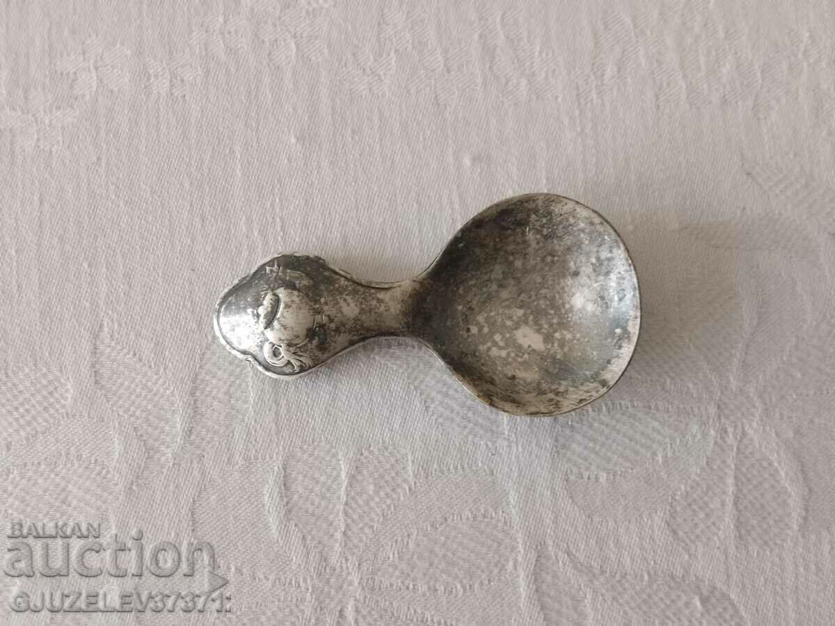 Art deco spoon for feeding a child or for measuring tea