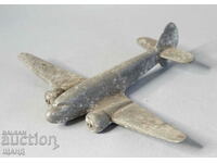 Old metal toy model airplane