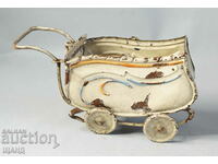 Old metal toy model baby carriage doll