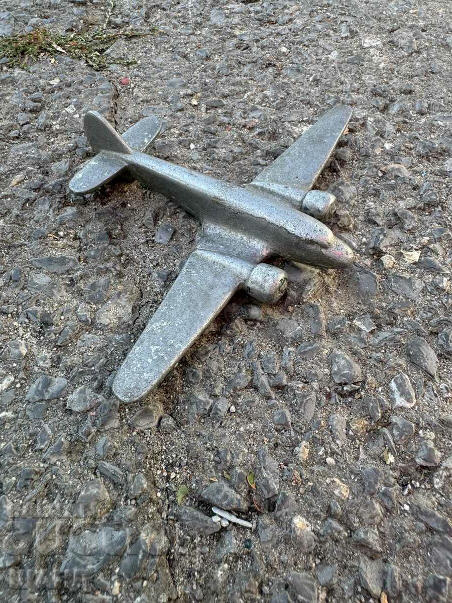 Old metal toy model airplane