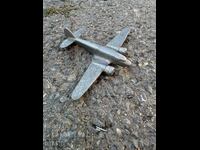 Old metal toy model airplane