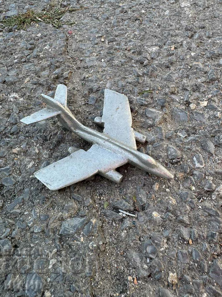 Old metal toy model airplane fighter