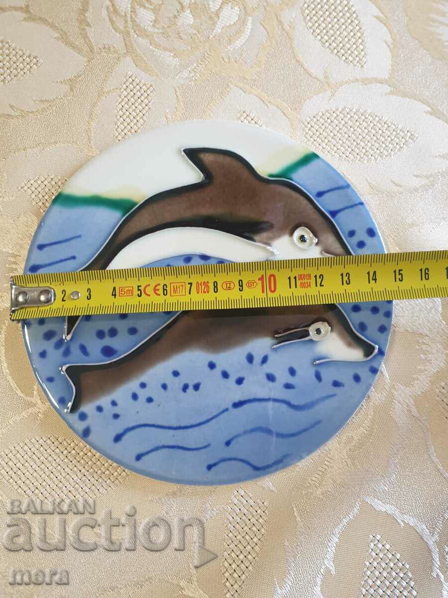 Porcelain tile with a pair of dolphins with price 12.00 BGN | € 6.14 Porcelain tile with a pair of dolphins with price 12.00 BGN | € 6.14