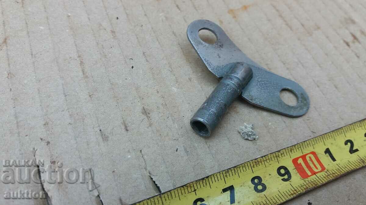 Auction WALL CLOCK KEY - AMBER Auction WALL CLOCK KEY - AMBER