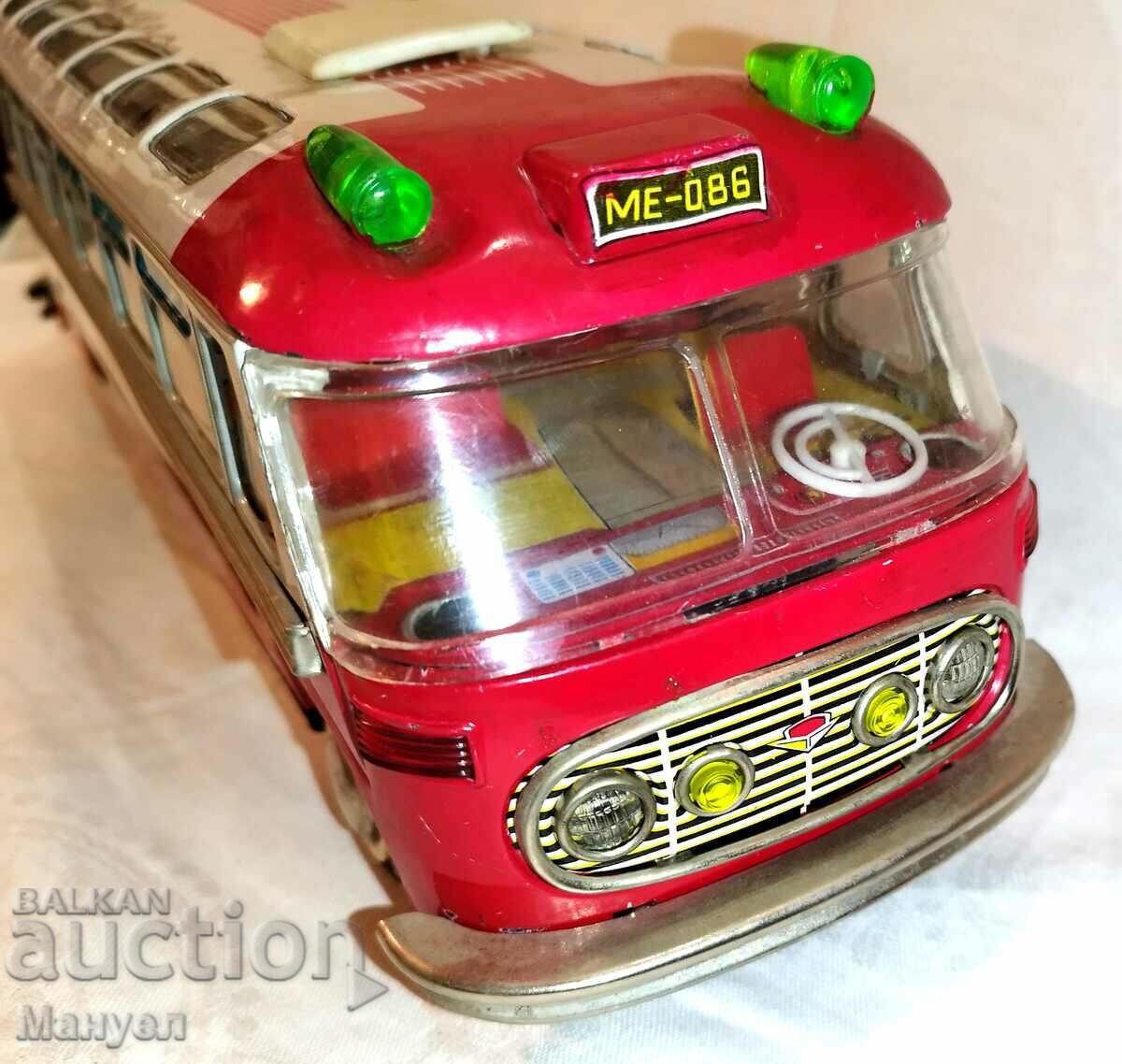 Auction  Old metal mechanical toy.