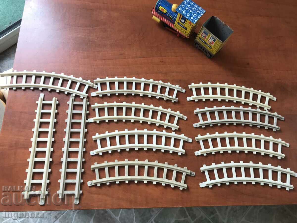 Delivery of OLD TIN TOY LOCOMOTIVE WITH WAGON AND RAILS Delivery of OLD TIN TOY LOCOMOTIVE WITH WAGON AND RAILS