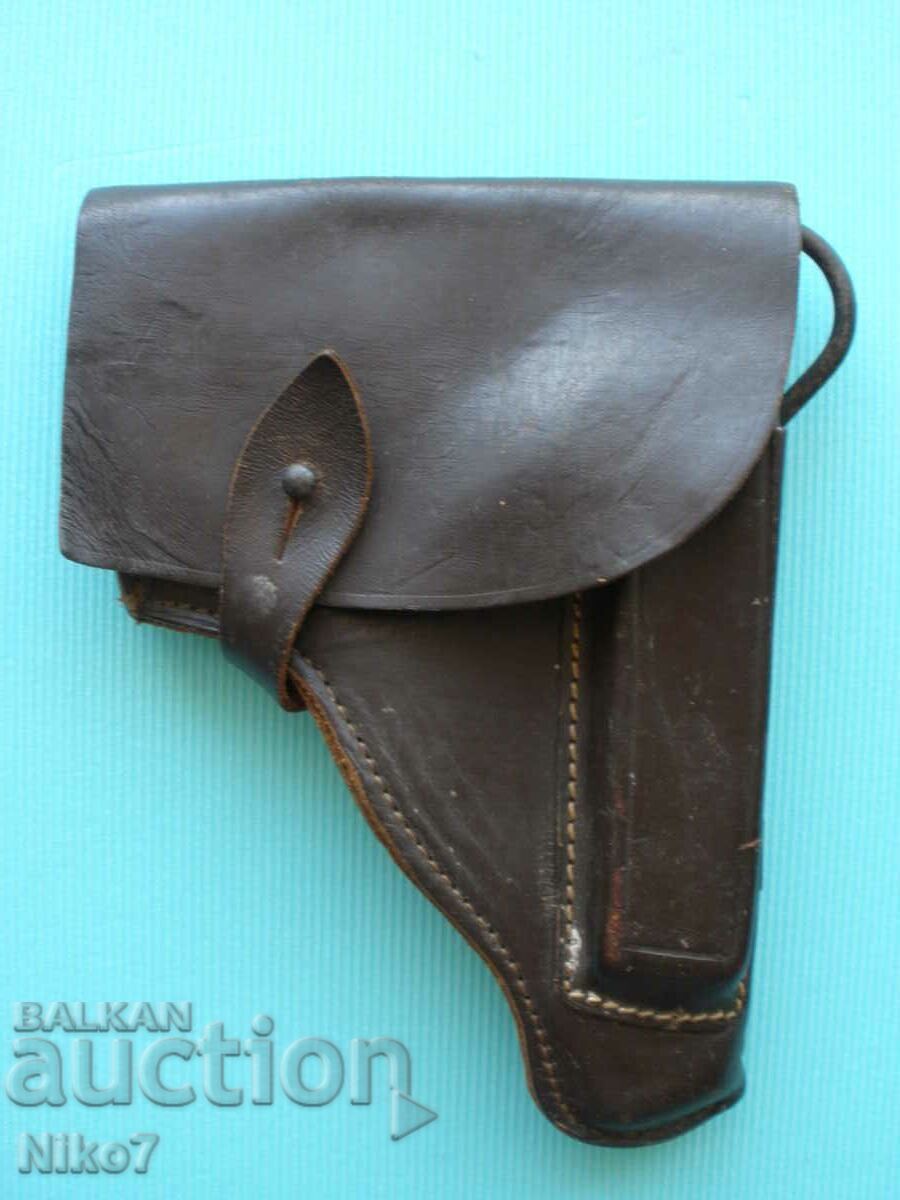 Old, leather, military, holster with ramrod.