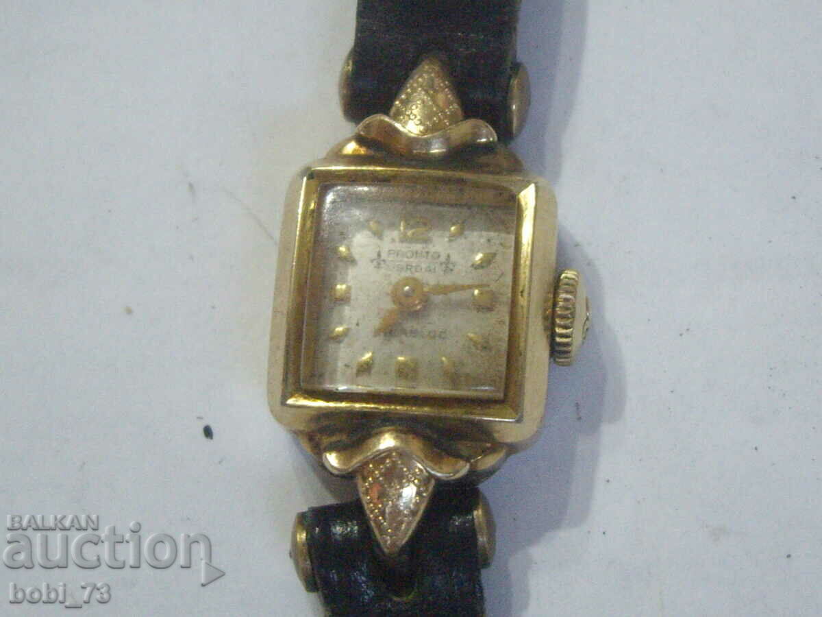 Old gold plated ladies watch.