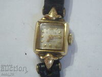 Old gold plated ladies watch.