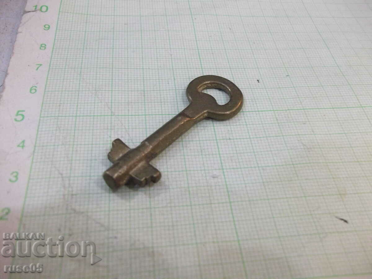 Δημοπρασία Χάλκινο κλειδί για μια παλιά κλειδαριά Δημοπρασία Χάλκινο κλειδί για μια παλιά κλειδαριά