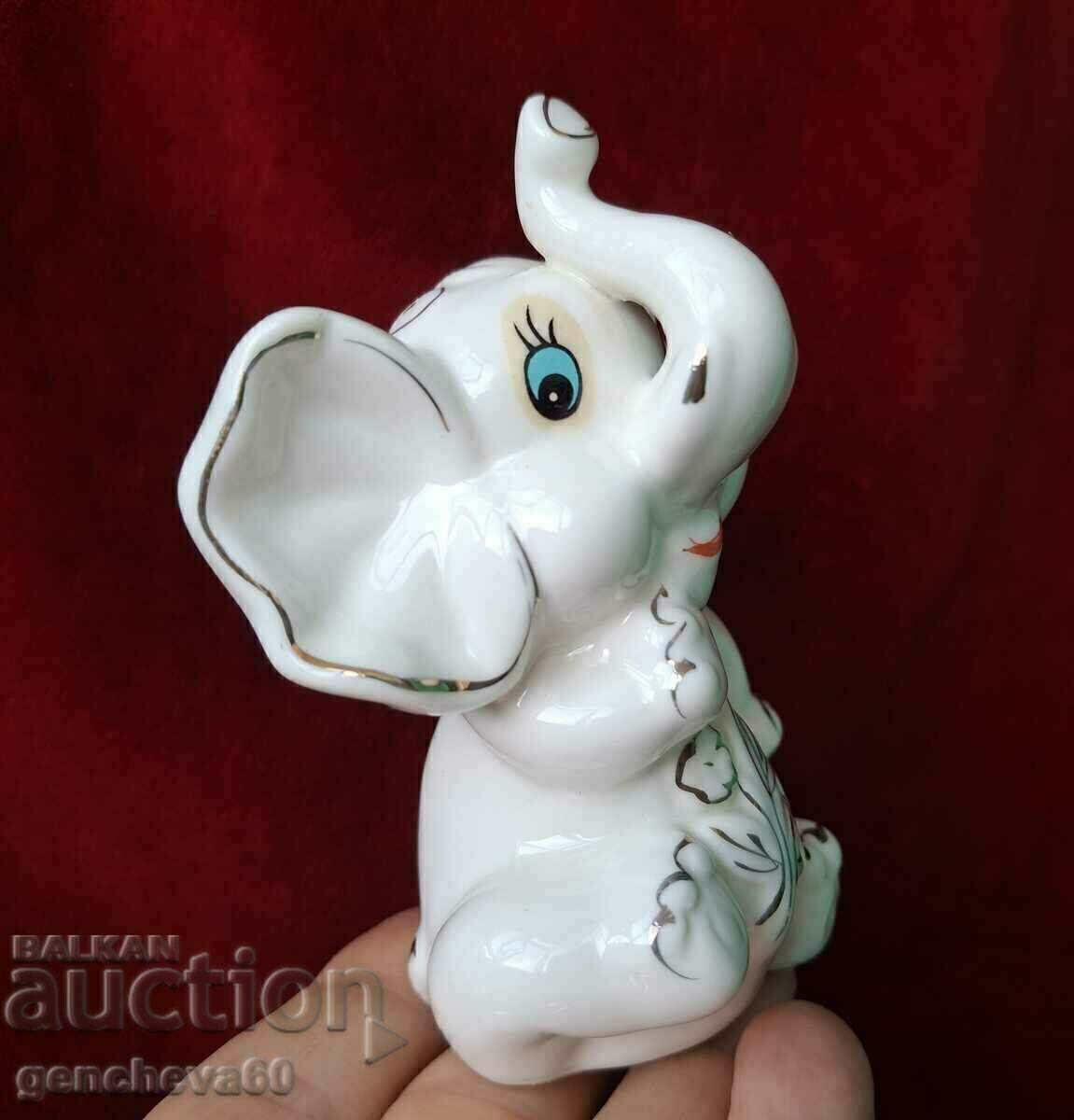 Auction  Beautiful porcelain elephant for good luck