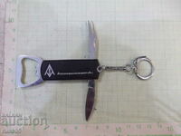 Keychain "Agromashinaimpex" leg, fork and opener