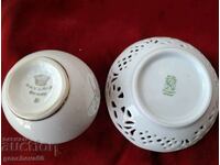 A beautiful vase and saucer made of fine porcelain