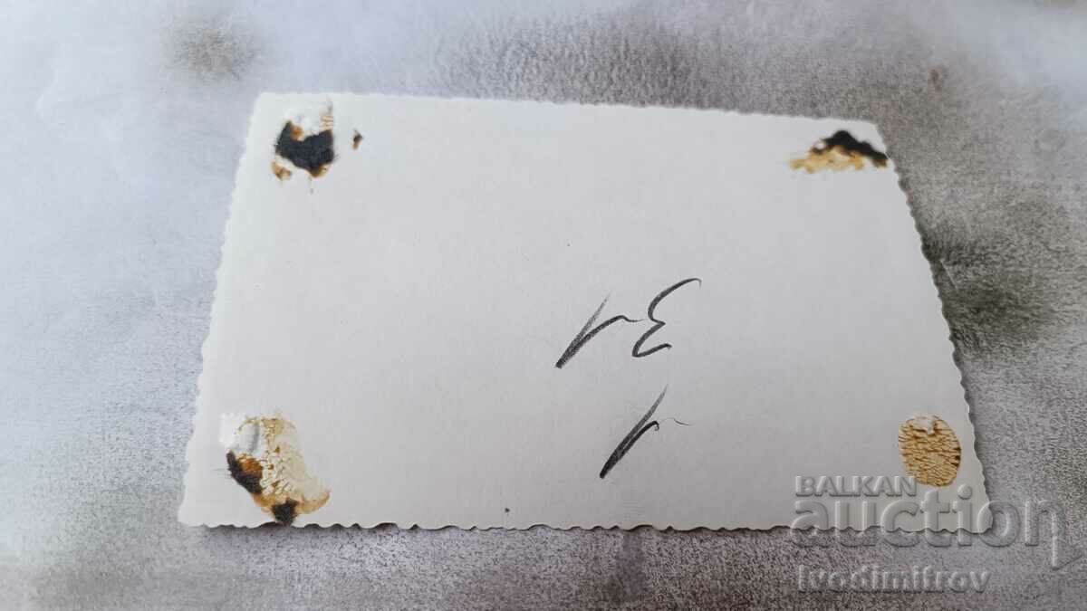 Photo Sofia A man and three women next to the building of TSUM with price 2.45 BGN | € 1.25 Photo Sofia A man and three women next to the building of TSUM with price 2.45 BGN | € 1.25