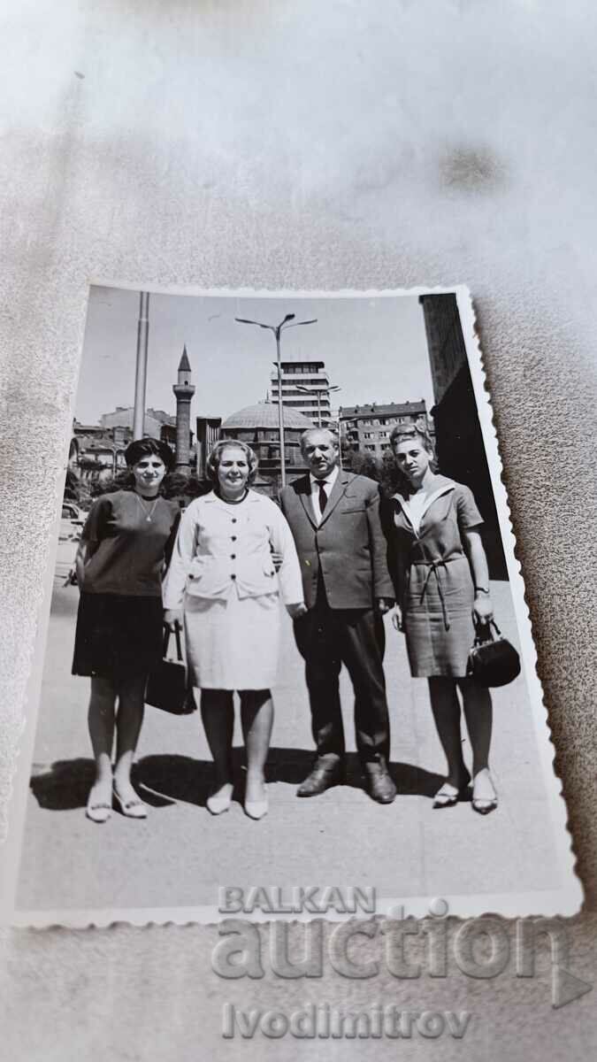 Photo Sofia A man and three women next to the building of TSUM