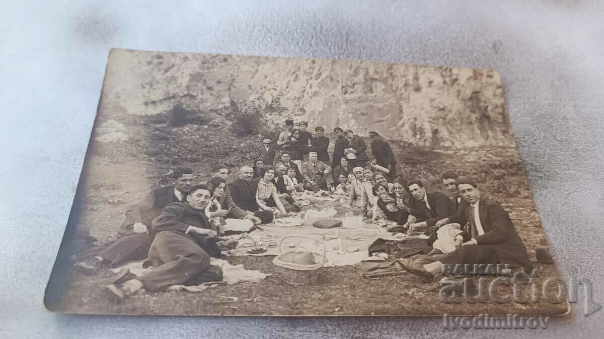 Photo Pleven Young men and women on a picnic by the rocks, 1930