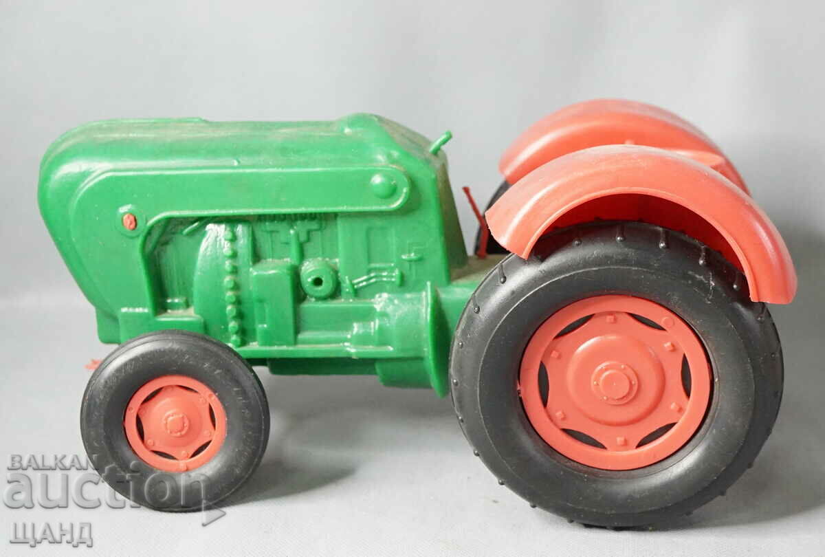 Old SOC. Bulgarian plastic toy tractor model