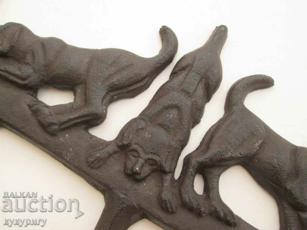 Auction Old metal cast iron wall hanger with cast iron dogs Auction Old metal cast iron wall hanger with cast iron dogs