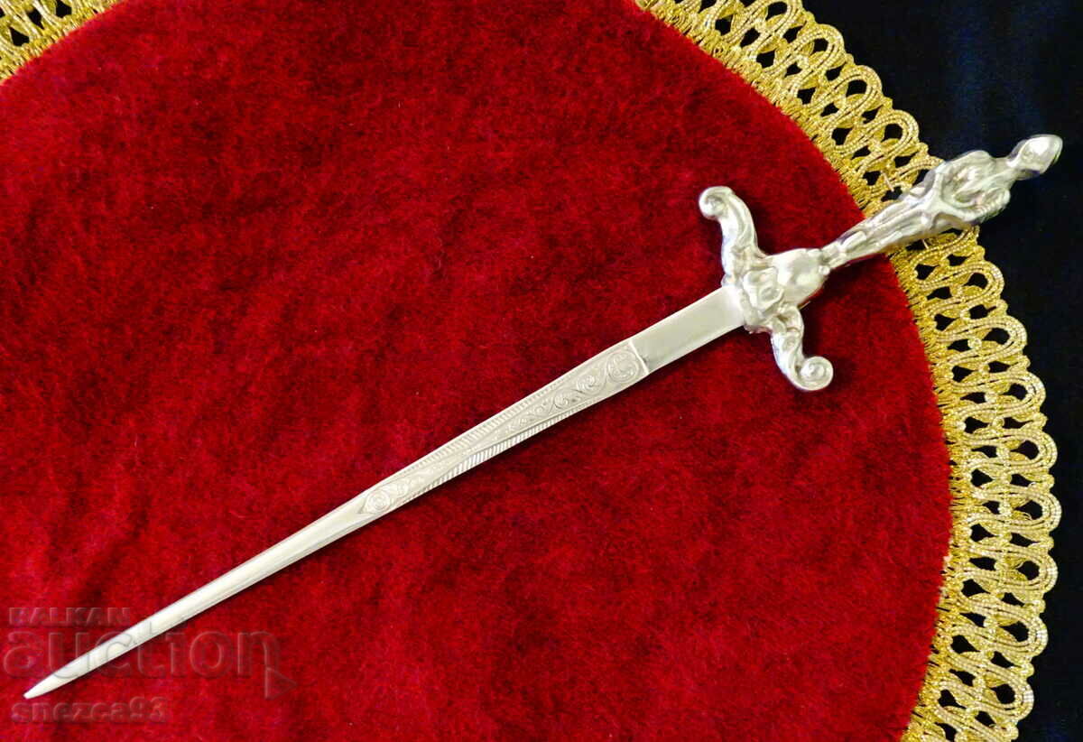 Antique dagger with the figure of a Knight Templar.