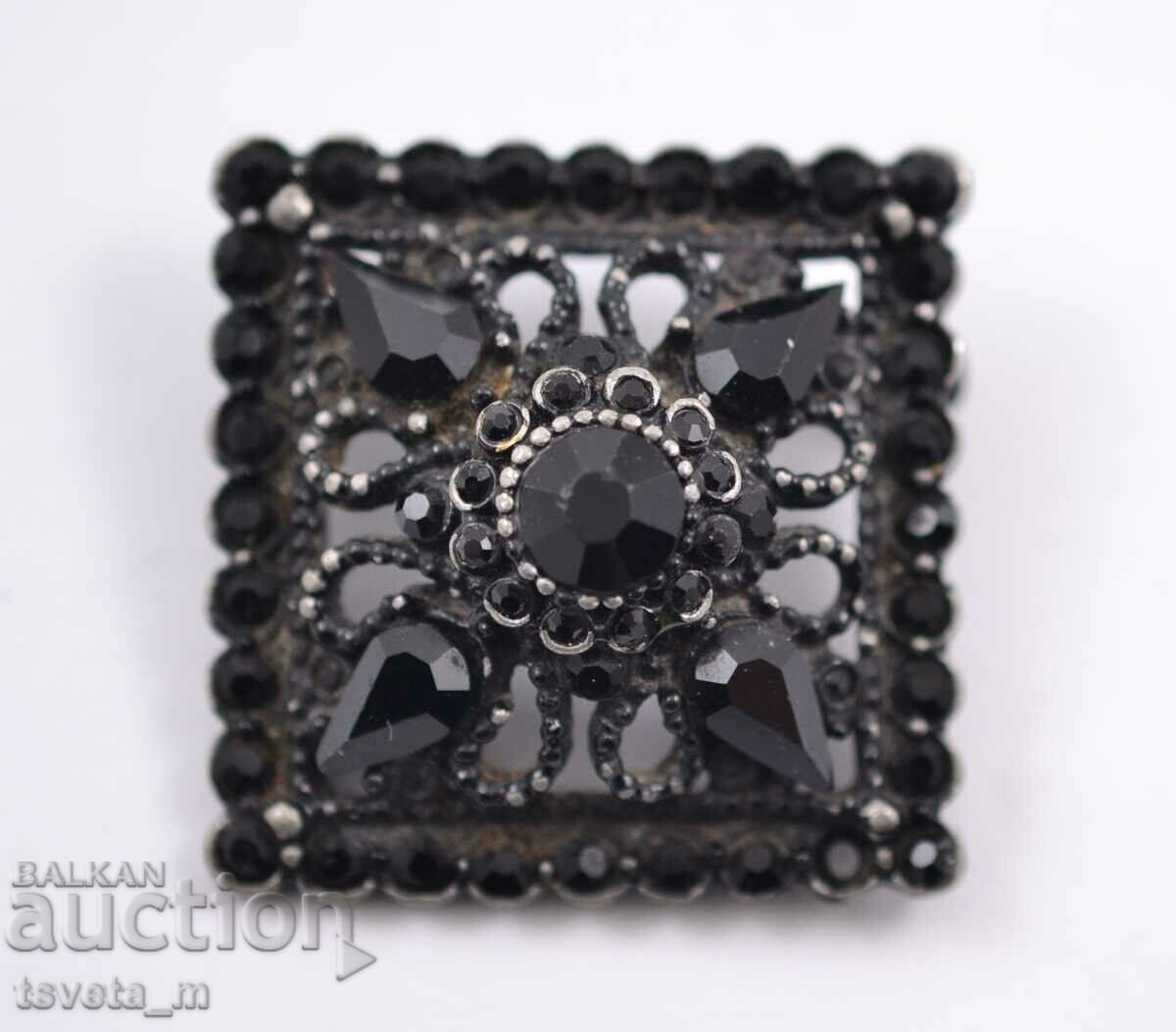 Antique brooch, black