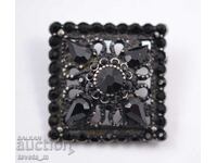 Antique brooch, black