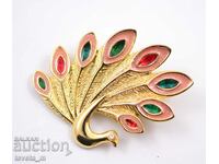 Antique peacock brooch