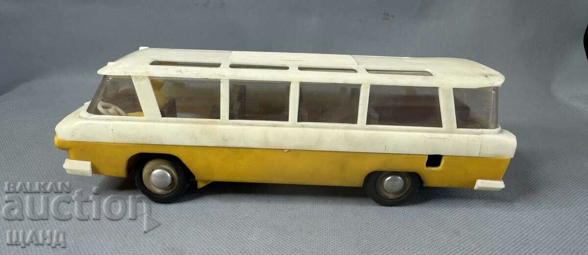 Old Russian plastic mechanical toy bus model