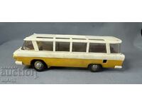 Old Russian plastic mechanical toy bus model