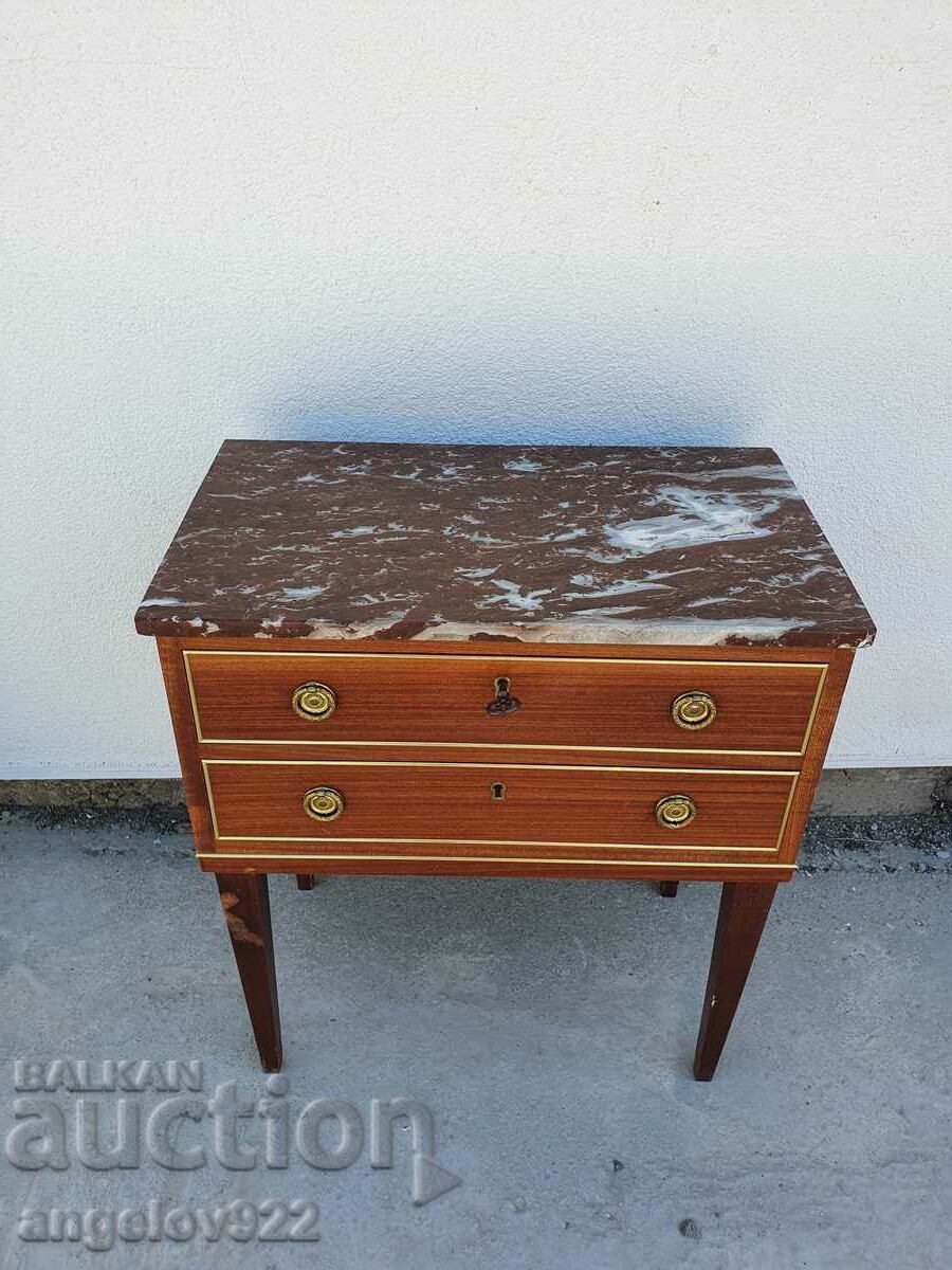 A beautiful chest of drawers with a marble top!!!