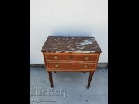 A beautiful chest of drawers with a marble top!!!