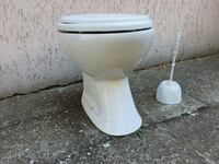 I am selling a new toilet bowl with a new lid and a new brush. BZC