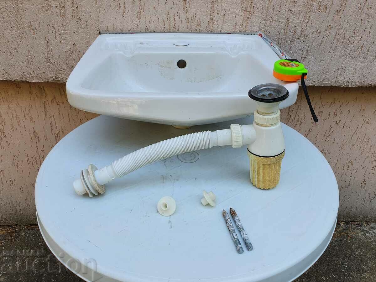 I am selling a bathroom sink plus siphon. BZC