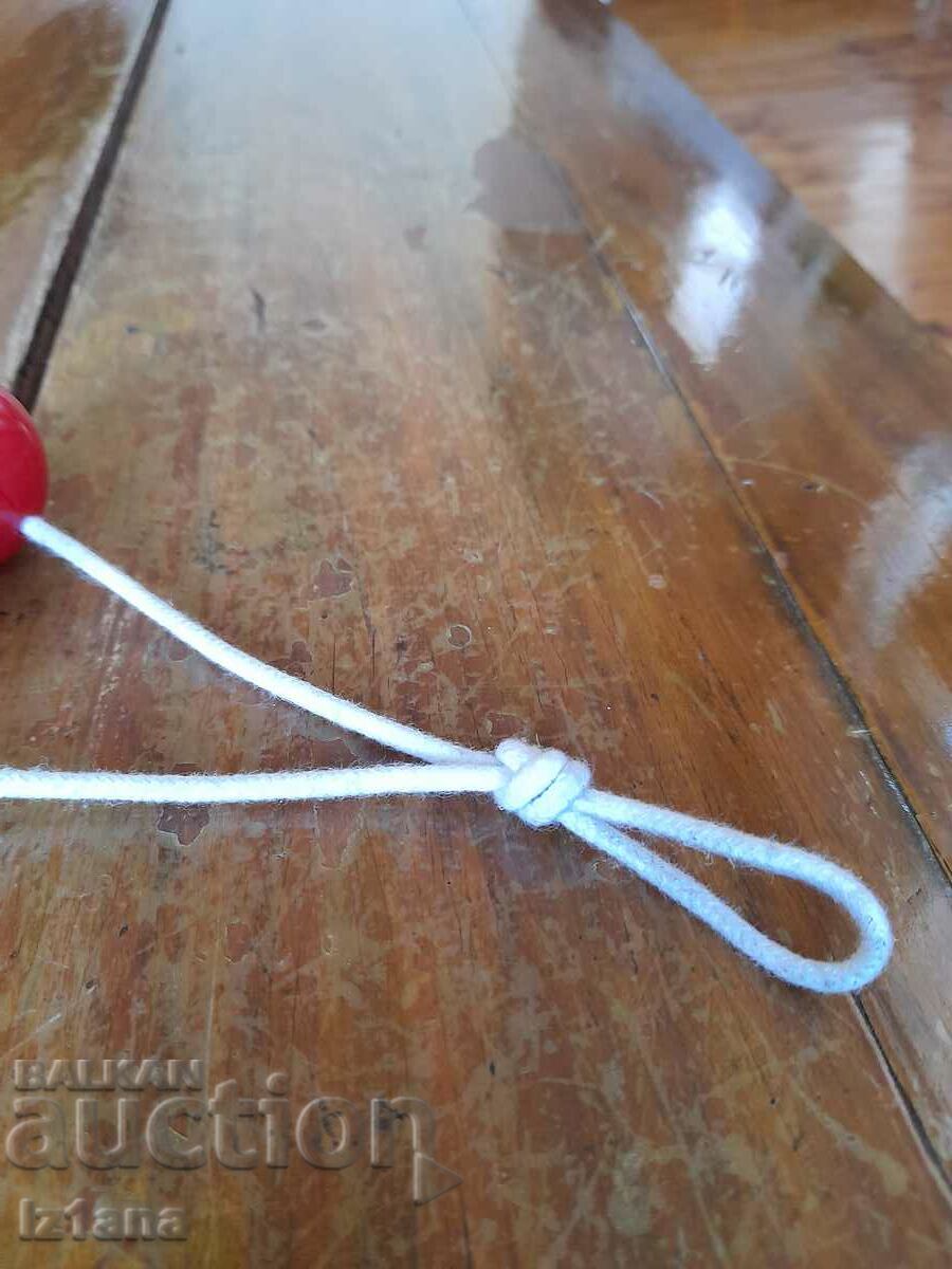 Auction  Old toy, rattling balls