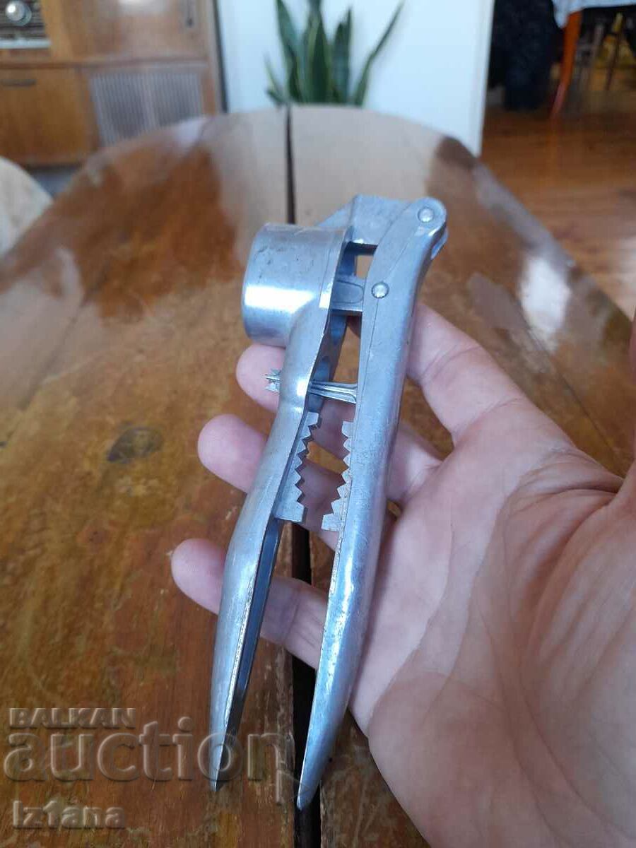 Old aluminum garlic press with price 22.00 BGN | € 11.25 Old aluminum garlic press with price 22.00 BGN | € 11.25