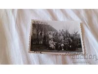 Photo Rousse Military doctor with a group of women 1943