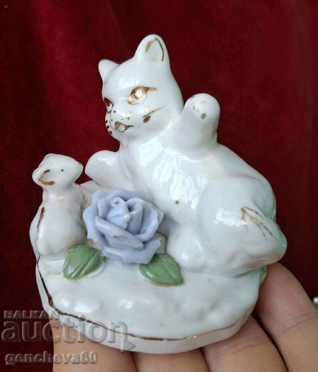 Porcelain cat figurine Porcelain cat figurine