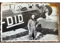 VSV military in front of a plane