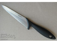 Kitchen knife stainless. stomach 29/3 cm plastic. handle preserved