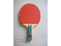 An old table tennis racket