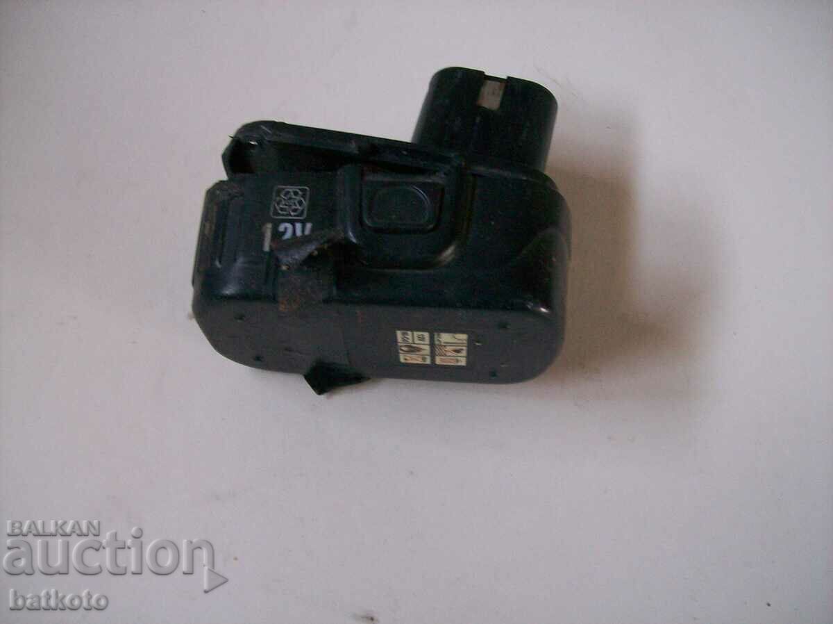 Auction  A working screwdriver with a dead battery