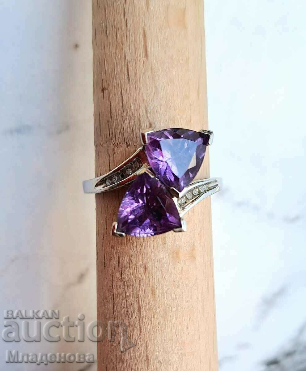 Silver ring with amethysts