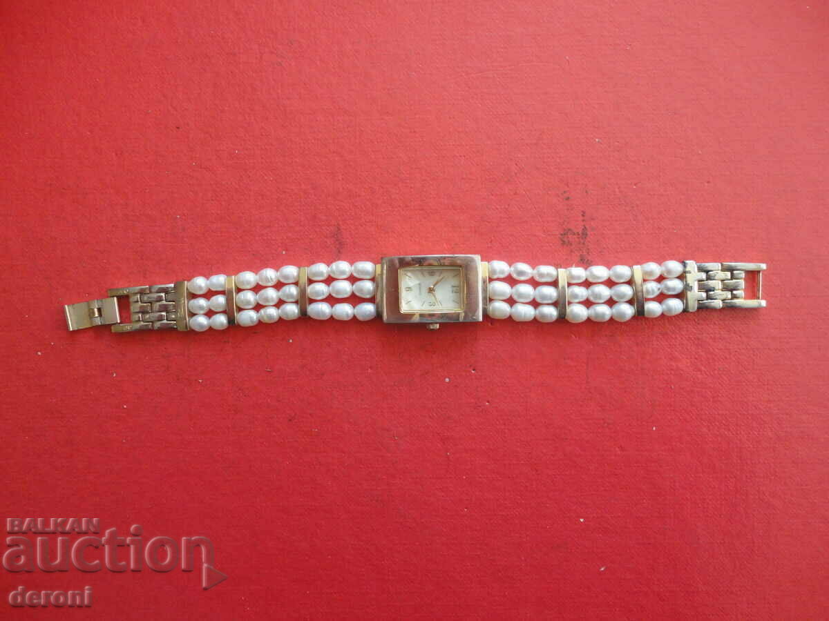 Γυναικείο ρολόι με πέρλες με τιμή 25.00 BGN | € 12.78 Γυναικείο ρολόι με πέρλες με τιμή 25.00 BGN | € 12.78