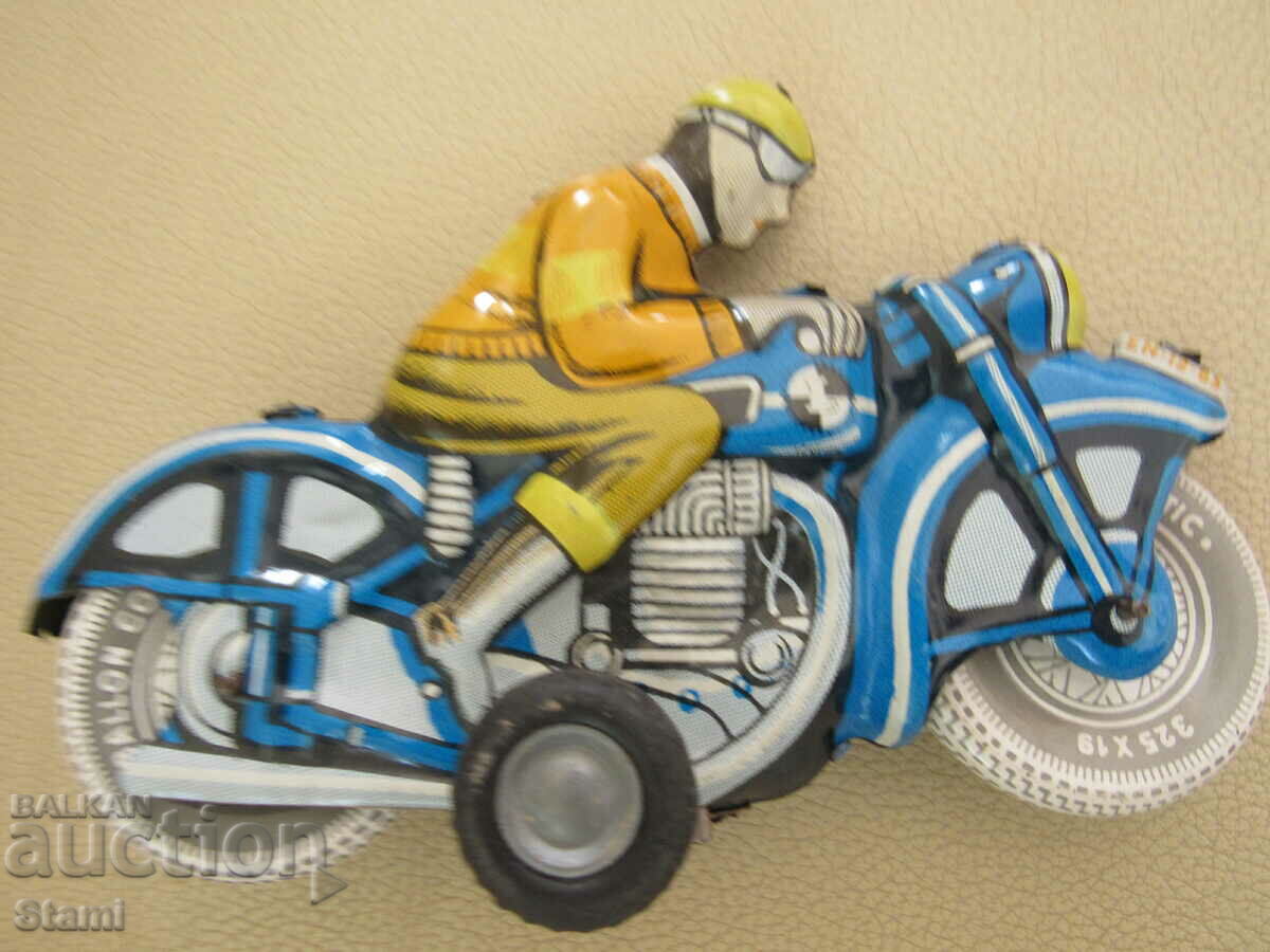 Auction  Children's toy biker from the time of the Soviet Union