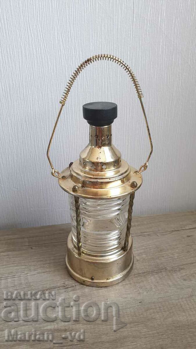 Glass alcohol bottle with lantern