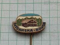 ŠVAJČIARSKA BÚDA BADGE ENAMEL