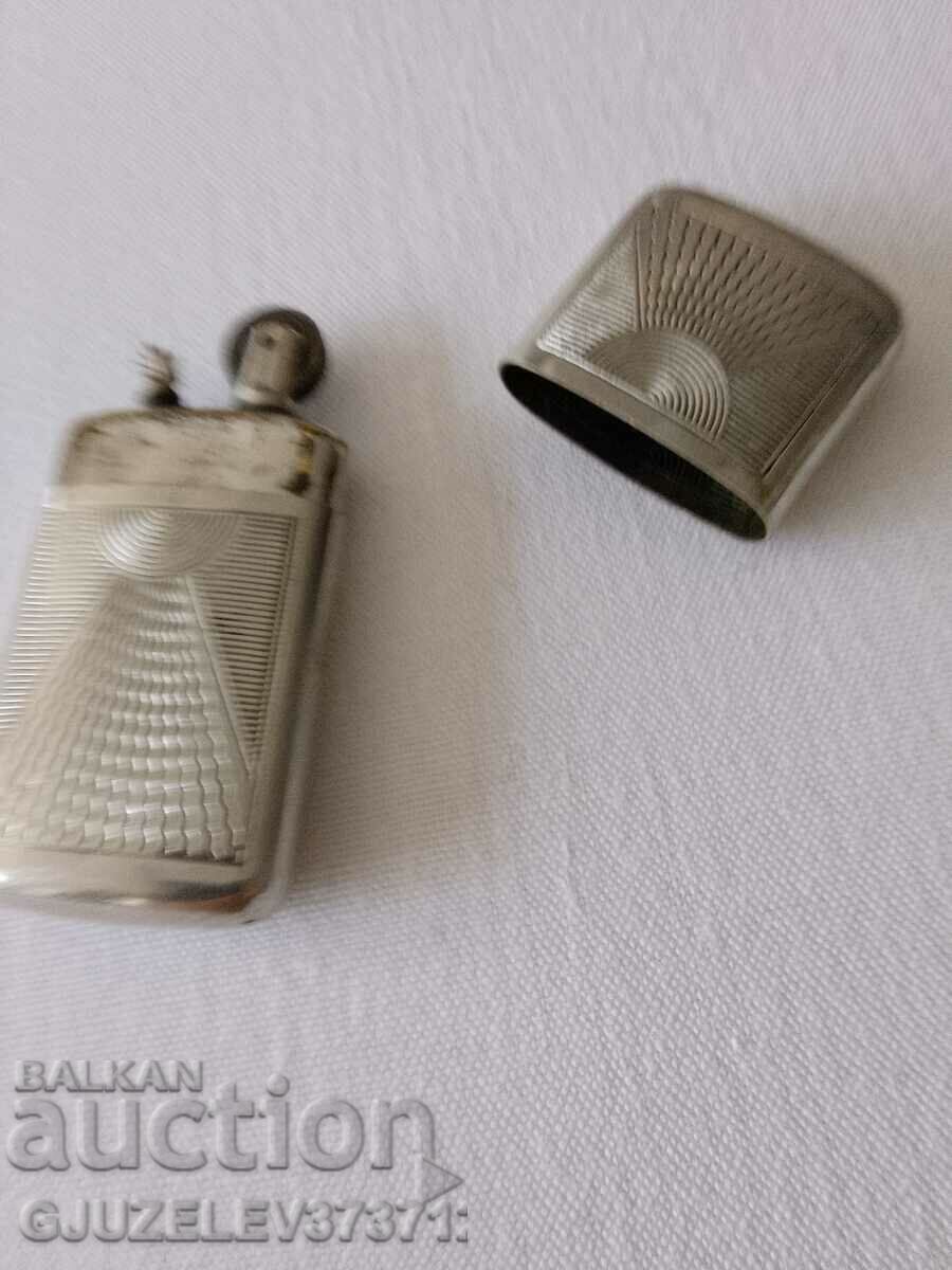 Delivery of Old Art Deco silver metal petrol lighter Delivery of Old Art Deco silver metal petrol lighter