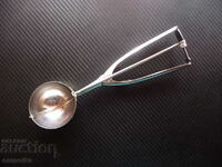 Metal spoon for ice cream balls ice cream cone