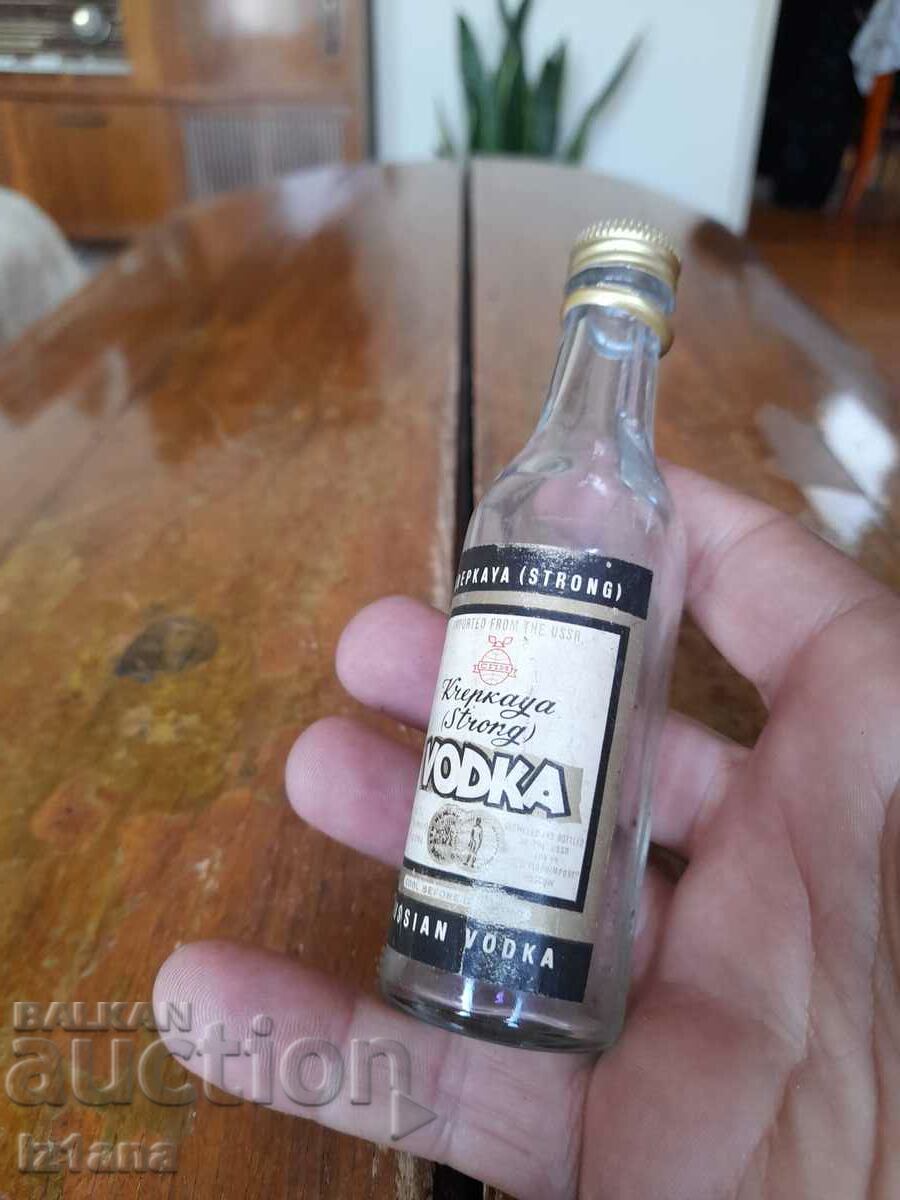 Auction An old bottle, a bottle of Strong Vodka Auction An old bottle, a bottle of Strong Vodka