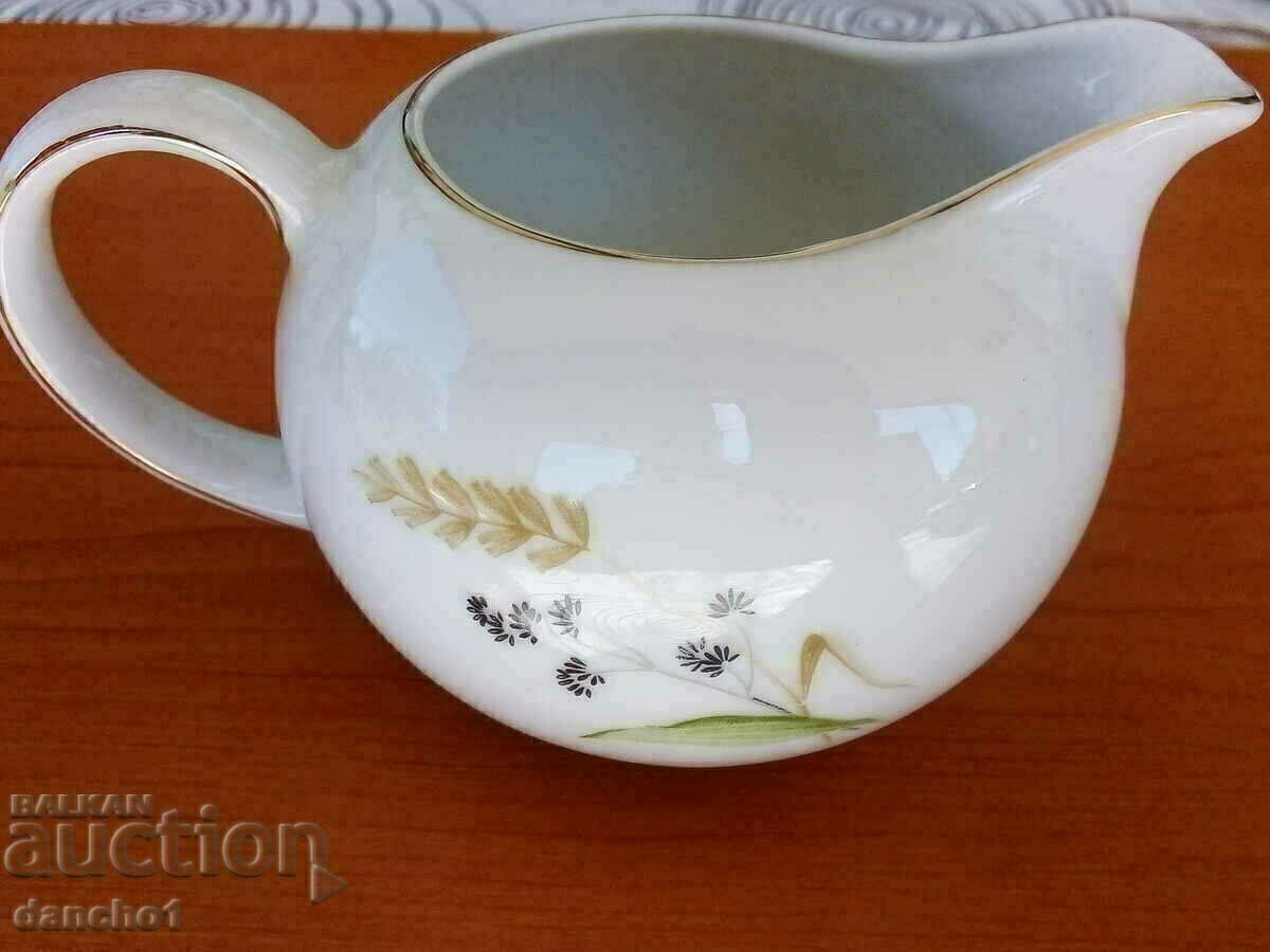 Livrarea ulcior de lapte Livrarea ulcior de lapte